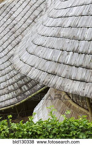 Close up of circular thatched roofs View Large Photo Image Stock Photo - Close up of circular thatched roofs. Fotosearch
