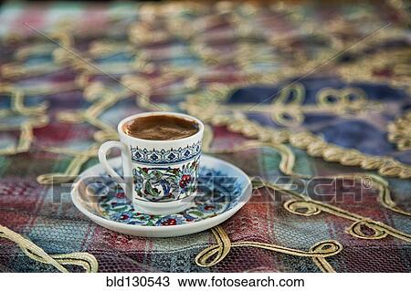 Stock Image - Close up of cup of Turkish coffee. Fotosearch