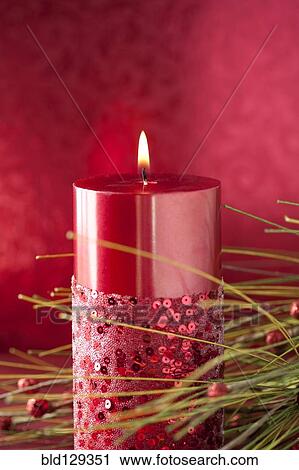 Close up of decorative red candle View Large Photo Image Stock Image - Close up of decorative red candle. Fotosearch