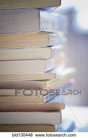 Stock Photo - Close up of paperback book spines. Fotosearch