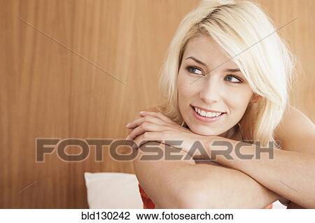 Stock Image - Close up of woman's smiling face. Fotosearch