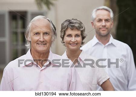 Friends smiling together outdoors View Large Photo Image Picture - Friends smiling together outdoors. Fotosearch