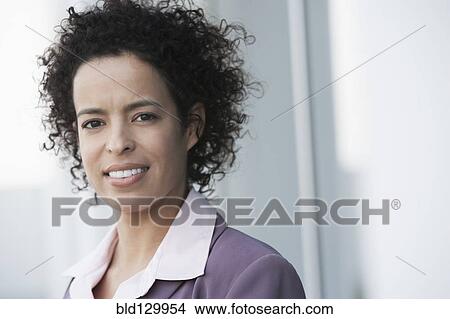 Hispanic businesswoman smiling View Large Photo Image Picture - Hispanic businesswoman smiling. Fotosearch