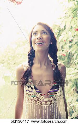 Hispanic woman walking outdoors View Large Photo Image Stock Photo - Hispanic woman walking outdoors. Fotosearch