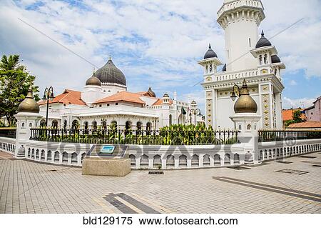 Stock Photography - Kapitan Keling Mosque under blue sky, George Town, Penang, Malaysia. Fotosearch