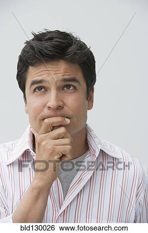 Man thinking with chin in hand View Large Photo Image Stock Photograph - Man thinking with chin in hand. Fotosearch