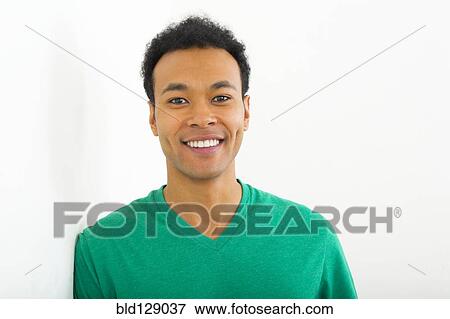 Stock Photo - Mixed race man smiling. Fotosearch