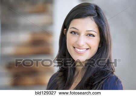 Mixed race woman smiling View Large Photo Image Stock Photo - Mixed race woman smiling. Fotosearch