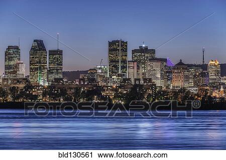 Montreal city skyline lit up at night, Quebec, Canada View Large Photo Image Stock Image - Montreal city skyline lit up at night, Quebec, Canada. Fotosearch