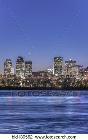 Montreal city skyline lit up at night, Quebec, Canada View Large Photo Image Stock Image - Montreal city skyline lit up at night, Quebec, Canada. Fotosearch