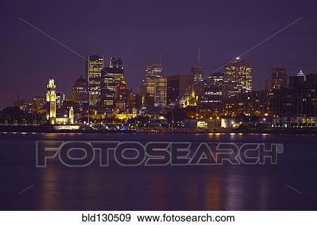 Montreal city skyline lit up at night, Quebec, Canada View Large Photo Image Stock Photo - Montreal city skyline lit up at night, Quebec, Canada. Fotosearch