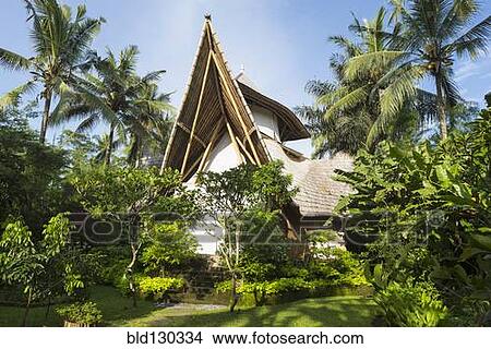 Ornate wood building in tropical landscape View Large Photo Image Picture - Ornate wood building in tropical landscape. Fotosearch