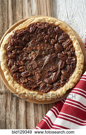 Pecan pie on tablecloth View Large Photo Image Stock Photo - Pecan pie on tablecloth. Fotosearch
