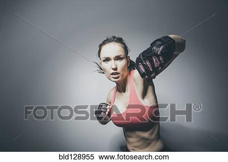 Portrait of Caucasian woman in fighting stance View Large Photo Image Stock Photography - Portrait of Caucasian woman in fighting stance. Fotosearch