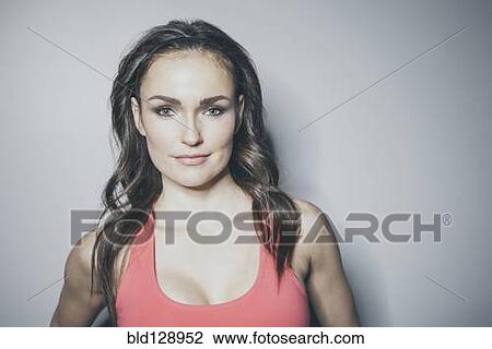 Portrait of Caucasian woman in sports-bra View Large Photo Image Stock Image - Portrait of Caucasian woman in sports-bra. Fotosearch