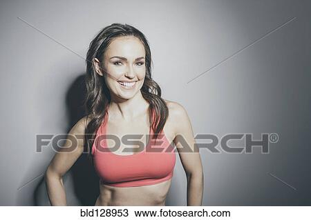 Portrait of Caucasian woman in sports-bra View Large Photo Image Stock Image - Portrait of Caucasian woman in sports-bra. Fotosearch