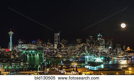 Seattle skyline lit up at night, Washington, USA View Large Photo Image Stock Photography - Seattle skyline lit up at night, Washington, USA. Fotosearch