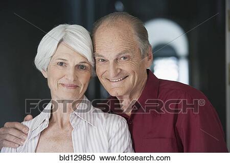 Stock Image - Senior Caucasian couple smiling together. Fotosearch