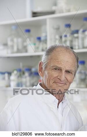 Senior Caucasian scientist working in lab View Large Photo Image Stock Photograph - Senior Caucasian scientist working in lab. Fotosearch