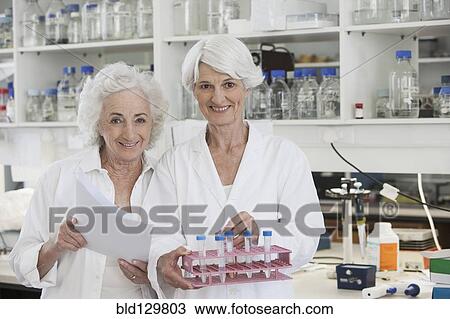 Senior Caucasian scientists working in lab View Large Photo Image Stock Image - Senior Caucasian scientists working in lab. Fotosearch