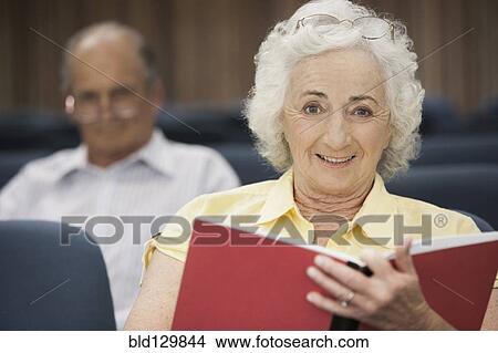 Picture - Senior Caucasian students sitting in classroom. Fotosearch