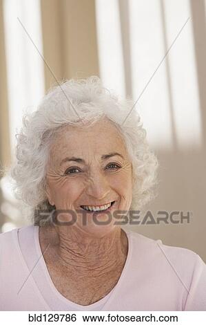 Stock Photograph - Senior Caucasian woman smiling. Fotosearch