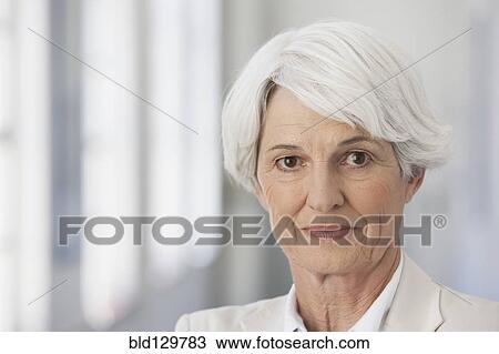 Serious senior Caucasian businesswoman View Large Photo Image Stock Image - Serious senior Caucasian businesswoman. Fotosearch