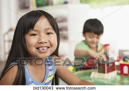 Smiling girl showing tooth gap View Large Photo Image Stock Image - Smiling girl showing tooth gap. Fotosearch