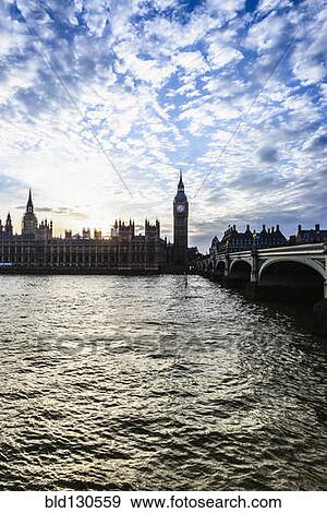 Sun setting over Houses of Parliament, London, United Kingdom View Large Photo Image Stock Photo - Sun setting over Houses of Parliament, London, United Kingdom. Fotosearch