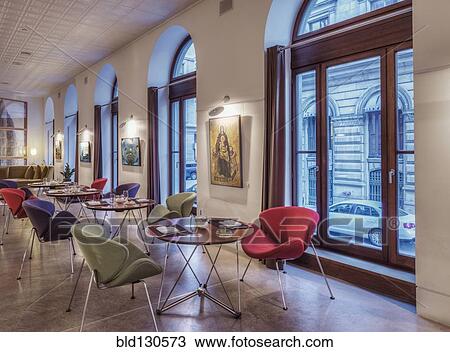 Tables and chairs in modern cafe View Large Photo Image Stock Image - Tables and chairs in modern cafe. Fotosearch