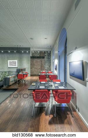Tables and chairs in modern cafe View Large Photo Image Stock Photo - Tables and chairs in modern cafe. Fotosearch