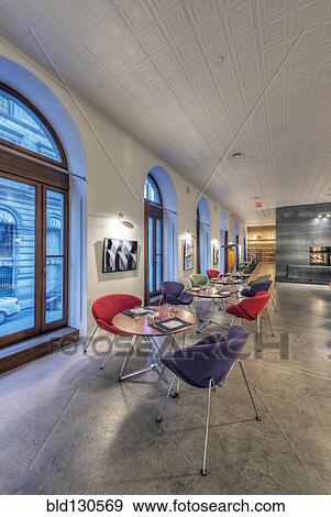 Stock Photo - Tables and chairs in modern cafe. Fotosearch