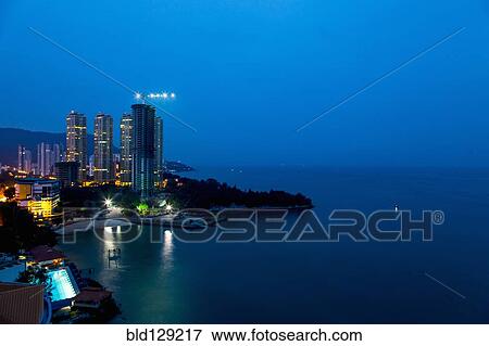 Tanjung Bungah coastline lit up at night, Penang, Malaysia View Large Photo Image Stock Photo - Tanjung Bungah coastline lit up at night, Penang, Malaysia. Fotosearch
