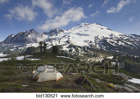 Stock Image - Tent at campsite in rocky mountain range, North Cascades, Washington, United States. Fotosearch