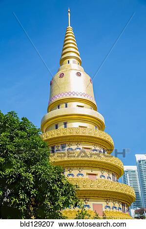 Stock Photo - Wat Chayamangkalaram temple under blue sky, George Town, Penang, Malaysia. Fotosearch