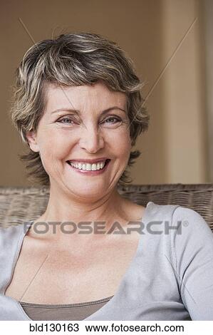Stock Image - Woman smiling. Fotosearch
