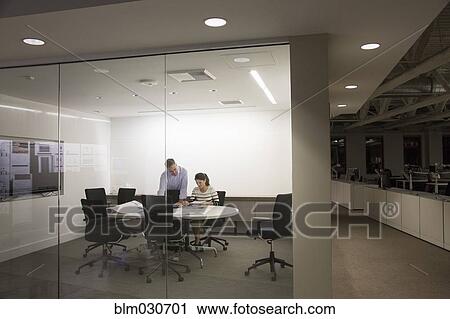 Business people having meeting in office View Large Photo Image Stock Image - Business people having meeting in office. Fotosearch