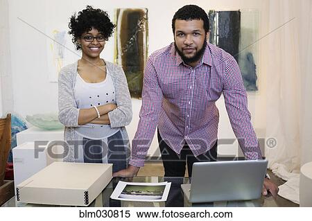Business people working in art gallery View Large Photo Image Stock Photography - Business people working in art gallery. Fotosearch