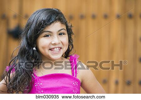 Hispanic girl smiling outdoors View Large Photo Image Stock Photography - Hispanic girl smiling outdoors. Fotosearch