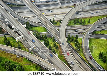 Stock Image - Aerial view of interstate change overpasses. Fotosearch