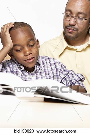 African American father helping son with homework View Large Photo Image Stock Image - African American father helping son with homework. Fotosearch