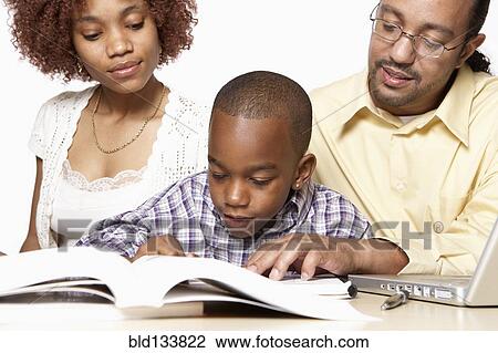 African American parents helping son with homework View Large Photo Image Stock Image - African American parents helping son with homework. Fotosearch