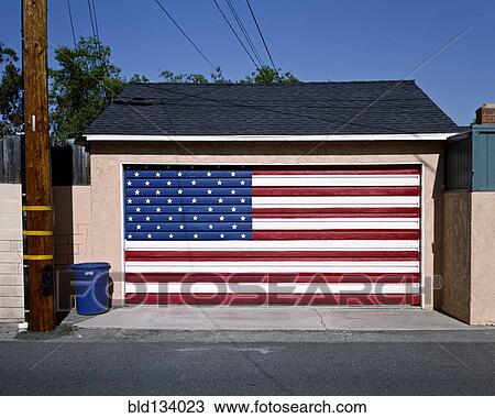 Stock Image - American flag painted on garage door. Fotosearch