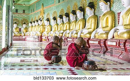 Asian Buddhist monks praying in temple, Mingun, Saigang, Myanmar View Large Photo Image Stock Image - Asian Buddhist monks praying in temple, Mingun, Saigang, Myanmar. Fotosearch