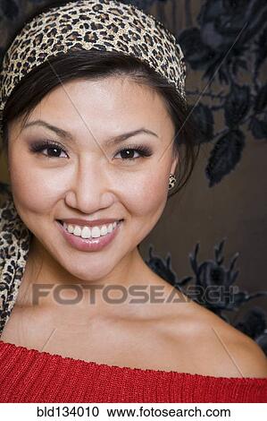 Stock Image - Asian woman smiling. Fotosearch