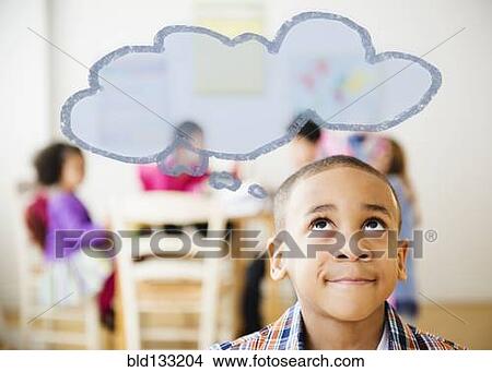 Picture - Boy with thought bubble over his head. Fotosearch