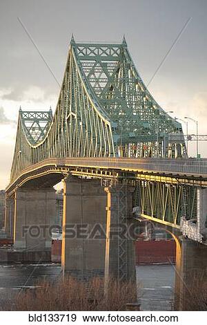 Stock Photo - Bridge over urban river. Fotosearch
