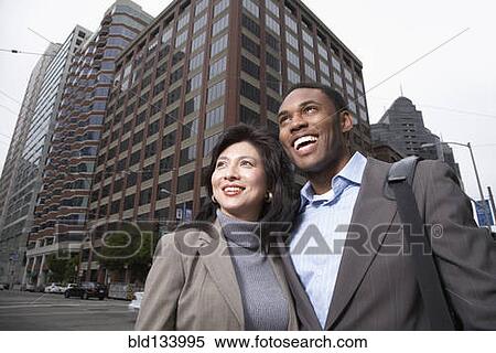 Business people standing on city street View Large Photo Image Stock Photography - Business people standing on city street. Fotosearch