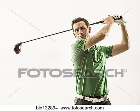 Picture - Caucasian man playing golf. Fotosearch