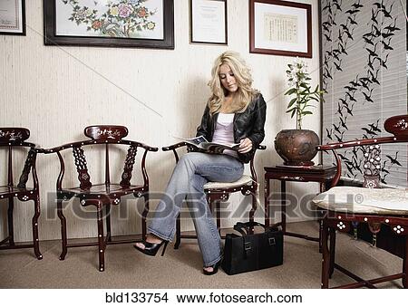 Caucasian woman sitting in Chinese medicine office View Large Photo Image Picture - Caucasian woman sitting in Chinese medicine office. Fotosearch